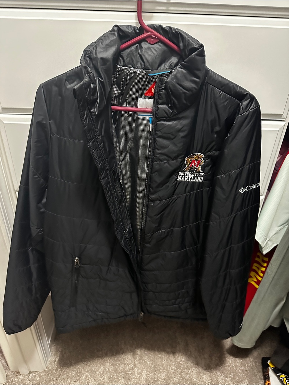 University of MD Columbia Black lightweight jacket. Water resistant
